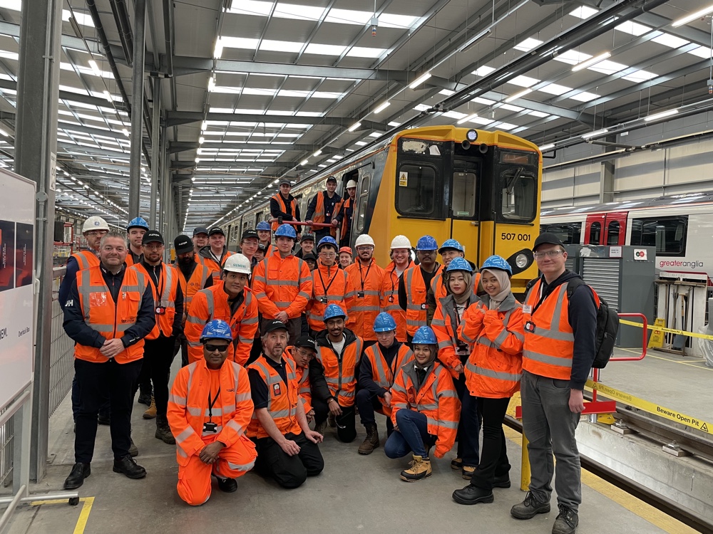 Photo of Unviersity Students and Alstom Apprentices in front of 507001 with members of C507PS