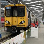 507001 at the depot with information boards outside